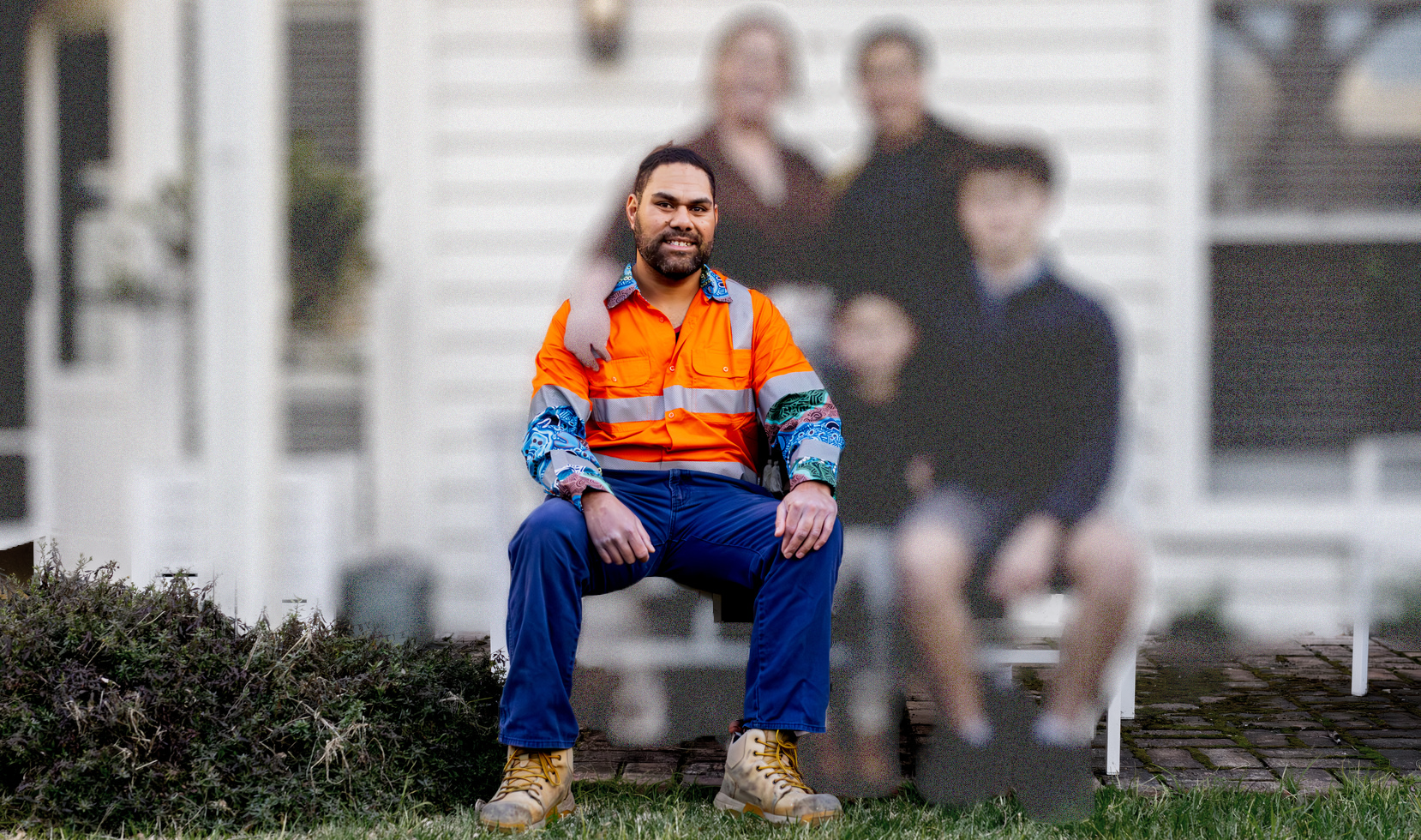 Blurred image of a family with one man in full focus. As you scroll down the page, the image fades to a clear image with all people in focus. A banner appears and says 'put all mental health carers in the picture’